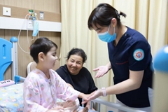 Tiga “Mama” Zhejiang, Seorang Anak Uygur